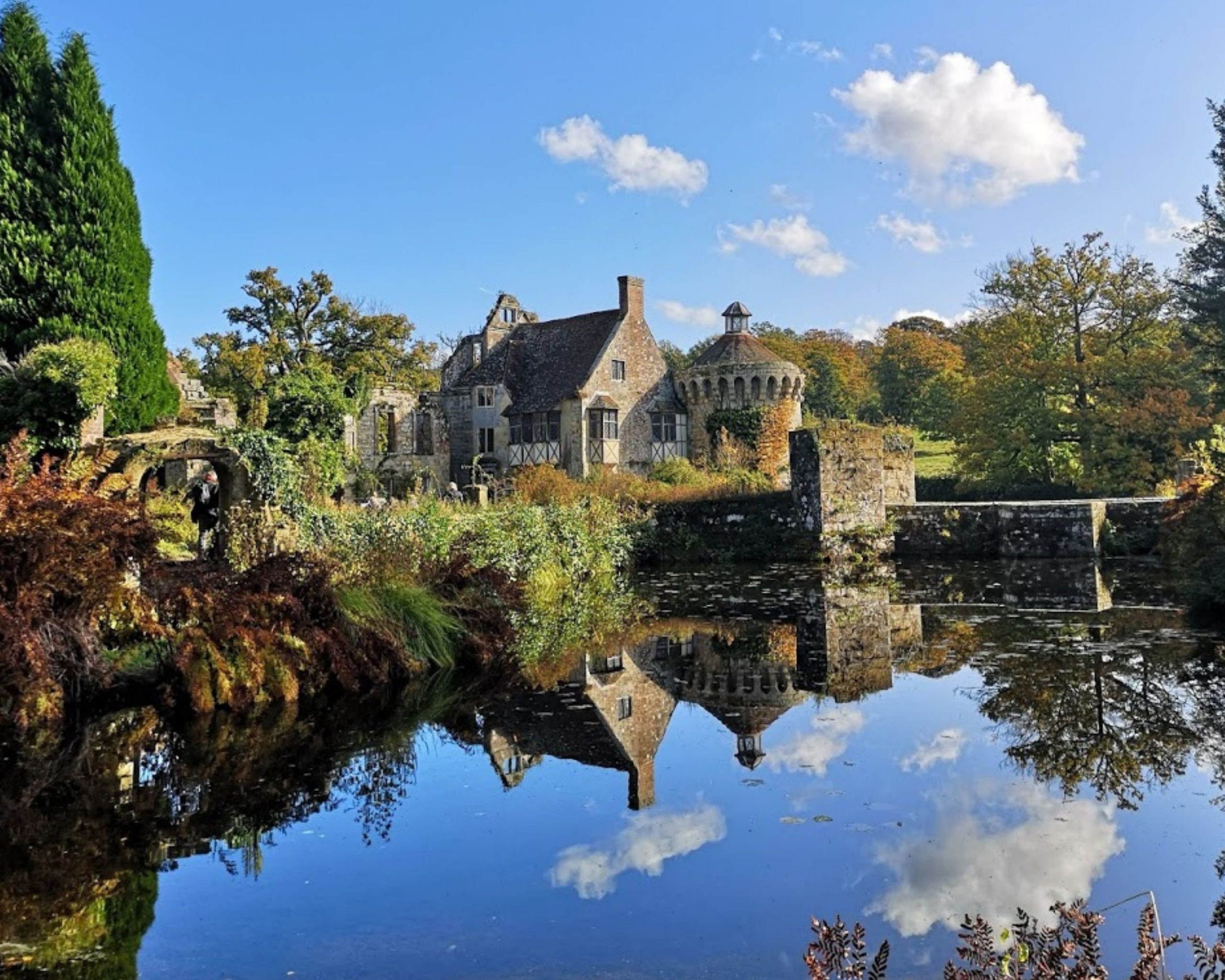 Scotney Castle reflected in the moat waters